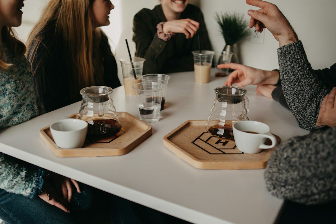 friends discussing at cafe