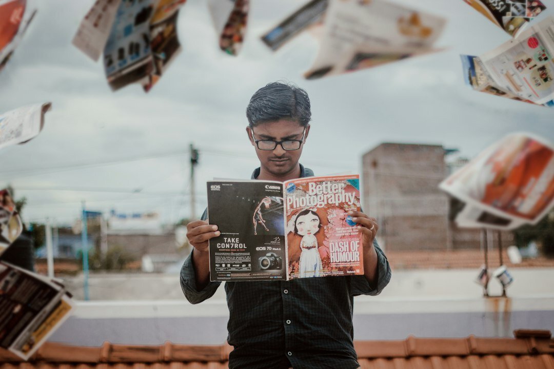 teenager looking at magazine